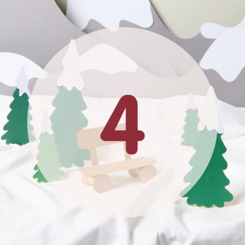 number 4 in red in a winter landscape