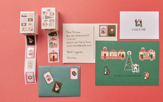 christmas cards, stickers and envelopes with a red background